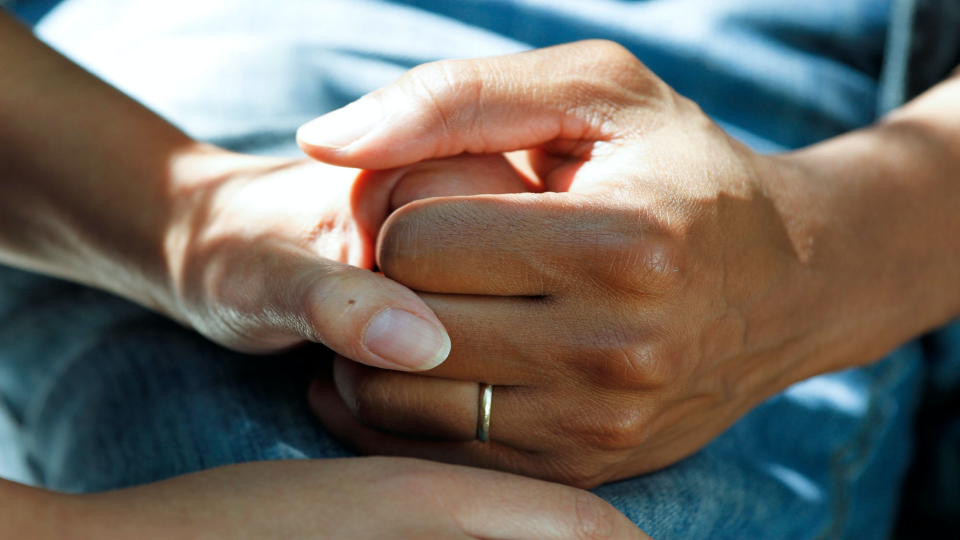 Clasping hands